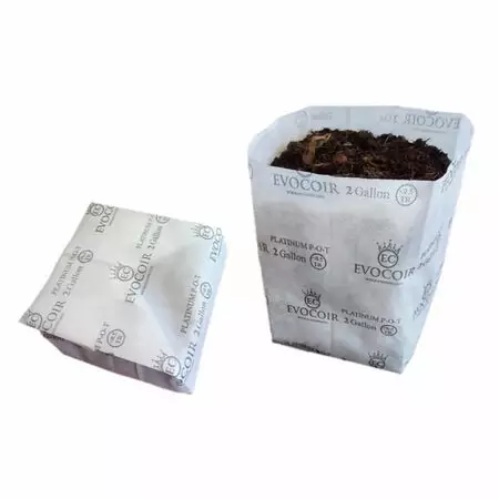 Evocoir Coco - 2 gallon compressed bag sitting next to 2 gallon expanded bag