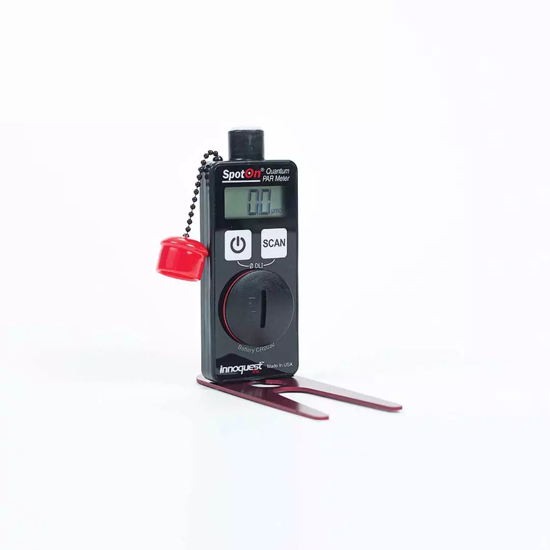 SpotOn Light Meter with cap off, sitting on fork base